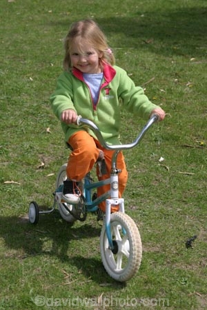 girl;girls;little;child;children;play;playing;playground;play_ground;play-ground;playgrounds;play_grounds;play-grounds;grass;green;grassy;outdoor;outdoors;outside;playtime;fun;moving;movement;childhood;happiness;happy;joy;kid;kids;bike;bikes;cycle;cycles;bicycle;bicycles;two_wheeler;two-wheeler;two_wheelers;two-wheelers;training-wheels;training_wheels;learn;learns;learning;learner;first-ride;ride;rider;riding;riders;training;daughter