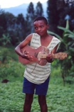 boy;male;africa;african;africans;east-africa;central-africa;instrument;ukelele;ukeleles;guitars;guitar;music;musical;play;perform;wood;wooden;home_made;young;rag;rags;child;children;kid;kids;poor;poverty;child;children;africa;african;africans;black;ethnic;person;portrait;portraits;tradition;traditional;culture;cultural;tribe;tribal;east-africa;central-africa;democratic-republic-of-congo;congo;zaire;jungle;rainforest;east-africa;central-africa