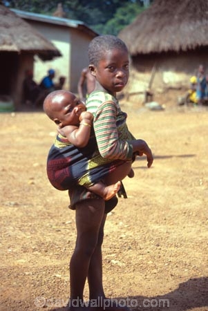 africa;african;africans;black;ethnic;people;person;persons;tradition;traditional;traditions-costume;traditional-costumes;culture;cultural;cultures;tribe;tribes;tribal;west-africa;indigenous;native;sahel;zala;zaala;village;ivory-coast;west-africa;cote-divoire;village;mud;hut;thatched;roof;huts;villages;girl;girls;sister;sisters;baby;babies;sibling;siblings;carry;carrying;child;children