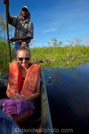 Africa;boat;boats;Botswana;canoe;canoes;delta;deltas;dugout;dugout-canoe;dugout-canoes;dugouts;Endorheic-basin;girl;girls;inland-delta;internal-drainage-systems;logboat;makoro;makoros;mekoro;mekoros;mokoro;mokoro-safari;mokoros;monoxylon;Okavango;Okavango-Delta;Okavango-Swamp;people;person;pirogue;pirogues;river-delta;Seven-Natural-Wonders-of-Africa;Southern-Africa;tourism;tourist;tourists