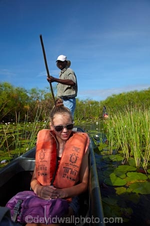 Africa;aquatic-plant;aquatic-plants;boat;boats;Botswana;canoe;canoes;Cyperaceae;Cyperus-papyrus;delta;deltas;dugout;dugout-canoe;dugout-canoes;dugouts;Endorheic-basin;girl;girls;inland-delta;internal-drainage-systems;logboat;makoro;makoros;mekoro;mekoros;mokoro;mokoro-safari;mokoros;monoxylon;Okavango;Okavango-Delta;Okavango-Swamp;paper-reed;paper-reeds;papyrus-reed;papyrus-reeds;papyrus-sedge;people;person;pirogue;pirogues;plant;plants;reed;reeds;river-delta;Seven-Natural-Wonders-of-Africa;Southern-Africa;tourism;tourist;tourists;water-plant;waterplants