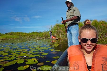 Africa;African;aquatic-plant;aquatic-plants;boat;boats;Botswana;canoe;canoes;Cyperaceae;Cyperus-papyrus;delta;deltas;dugout;dugout-canoe;dugout-canoes;dugouts;Endorheic-basin;girl;girls;inland-delta;internal-drainage-systems;lily-pad;lily-pads;logboat;makoro;makoros;mekoro;mekoros;mokoro;mokoro-safari;mokoros;monoxylon;Nymphaeaceae;Okavango;Okavango-Delta;Okavango-Swamp;paper-reed;paper-reeds;papyrus-reed;papyrus-reeds;papyrus-sedge;people;person;pirogue;pirogues;plant;plants;poler;polers;reed;reeds;river-delta;Seven-Natural-Wonders-of-Africa;Southern-Africa;tourism;tourist;tourists;water-lilies;water-lily;water-lily-pad;water-lily-pads;water-plant;water_lilies;water_lily;waterlilies;waterlily;waterlily-pad;waterlily-pads;waterplants