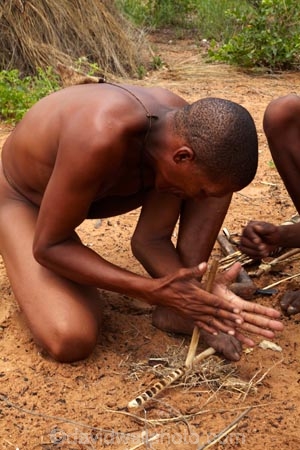 Africa;African;African-people;Bushman;Bushman-Living-Museum;Bushmanland;Bushmen;cultural;cultural-exchange;culture;demonstration;demonstrations;fire;fire-craft;fire-lighting;fire-lighting-with-sticks;Fire-making;fire-starting;fire-starting-with-sticks;fires;forager-society;Grashoek;Grashoek-Living-Museum;Grashoek-village;hunter_gatherer;Hunting-and-gathering;Ju-Hoansi_San-Living-Museum;JuHoansi;JuHoansi_San-men;JuHoansi_San-people;Living-Museum;Living-Museum-of-the-Ju-Hoansi_San;Living-Museum-of-the-JuHoansi_San;Living-Museums;making-fire;making-fires;Namibia;Namibia,-Africa;Otjozondjupa-District;Otjozondjupa-Region;people;person;rubbing-sticks-together;San;San-Living-Museum;San-people;Southern-Africa;tradition;traditional;Traditional-Bushman-Culture;traditional-clothing;traditional-costume;traditional-dress;traditional-fire-lighting;Traditional-San-Culture;tribe