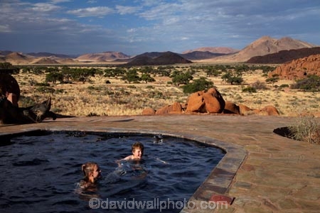 707-road;Africa;D707-road;Fest-Inn-Fels-Farm-Lodge;Fest-Inn-Fels-Lodge;Koiimasis;Koiimasis-Lodge;Namib-Desert;Namibia;people;person;pool;pools;Ranch-Koiimasis;Ranch-Koiimasis-Lodge;Southern-Africa;swim;swimmer;swimmers;swimming-pool;swimming-pools;Tiras-Mountains;Tiras-Mountains-Conservancy