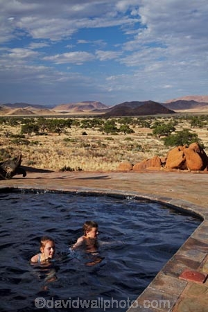 707-road;Africa;D707-road;Fest-Inn-Fels-Farm-Lodge;Fest-Inn-Fels-Lodge;Koiimasis;Koiimasis-Lodge;Namib-Desert;Namibia;people;person;pool;pools;Ranch-Koiimasis;Ranch-Koiimasis-Lodge;Southern-Africa;swim;swimmer;swimmers;swimming-pool;swimming-pools;Tiras-Mountains;Tiras-Mountains-Conservancy