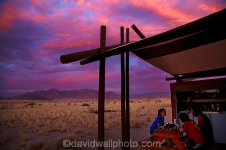 accommodation;Africa;children;cloud;clouds;color;colorful;colour;colourful;Desert-Camp;dusk;evening;families;family;family-holiday;family-holidays;holiday;holiday-accommodation;holidays;hotel;hotels;lodge;lodges;luxury-tent;luxury-tents;Namib-Desert;Namibia;night;night_time;nightfall;people;permanent-tent;permanent-tents;person;pink;red;resort;resorts;Sesriem;skies;sky;Southern-Africa;sunset;sunsets;tent;tents;twilight;vacation;vacations