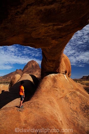 Africa;archway;archways;bald-granite-peak;bald-granite-peaks;bornhardts;boy;boys;child;children;Erongo-Region;families;family;family-holiday;family-holidays;geological;geology;Groot-Spitzkop;holiday;holidays;inselberg;inselbergs;monadnock;monadnocks;Namib-Desert;Namibia;Natural-Arch;Natural-Arches;natural-bridge;natural-bridges;natural-geological-formation;natural-geological-formations;Natural-Rock-Arch;natural-rock-arches;natural-rock-archs;natural-rock-bridge;natural-rock-bridges;people;person;rock;rock-arch;rock-arches;rock-formation;rock-formations;rock-outcrop;rock-outcrops;rock-tor;rock-torr;rock-torrs;rock-tors;rocks;Southern-Africa;Spitzkop;Spitzkoppe;stone;tourism;tourist;tourists;unusual-natural-feature;unusual-natural-features;unusual-natural-formation;unusual-natural-formations;wilderness;wilderness-area;wilderness-areas