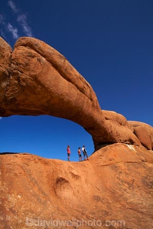Africa;archway;archways;boy;boys;child;children;Erongo-Region;families;family;family-holiday;family-holidays;female;geological;geology;girl;girls;Groot-Spitzkop;holiday;holidays;mother;Namib-Desert;Namibia;Natural-Arch;Natural-Arches;natural-bridge;natural-bridges;natural-geological-formation;natural-geological-formations;Natural-Rock-Arch;natural-rock-arches;natural-rock-archs;natural-rock-bridge;natural-rock-bridges;people;person;rock;rock-arch;rock-arches;rock-formation;rock-formations;rock-outcrop;rock-outcrops;rock-tor;rock-torr;rock-torrs;rock-tors;rocks;Southern-Africa;Spitzkop;Spitzkoppe;stone;tourism;tourist;tourists;unusual-natural-feature;unusual-natural-features;unusual-natural-formation;unusual-natural-formations;wilderness;wilderness-area;wilderness-areas;woman