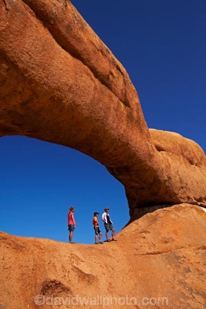 Africa;archway;archways;boy;boys;child;children;Erongo-Region;families;family;family-holiday;family-holidays;female;geological;geology;girl;girls;Groot-Spitzkop;holiday;holidays;mother;Namib-Desert;Namibia;Natural-Arch;Natural-Arches;natural-bridge;natural-bridges;natural-geological-formation;natural-geological-formations;Natural-Rock-Arch;natural-rock-arches;natural-rock-archs;natural-rock-bridge;natural-rock-bridges;people;person;rock;rock-arch;rock-arches;rock-formation;rock-formations;rock-outcrop;rock-outcrops;rock-tor;rock-torr;rock-torrs;rock-tors;rocks;Southern-Africa;Spitzkop;Spitzkoppe;stone;tourism;tourist;tourists;unusual-natural-feature;unusual-natural-features;unusual-natural-formation;unusual-natural-formations;wilderness;wilderness-area;wilderness-areas;woman