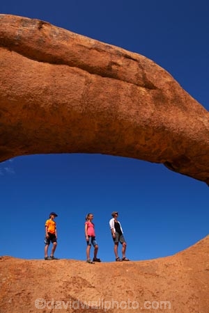Africa;archway;archways;boy;boys;child;children;Erongo-Region;families;family;family-holiday;family-holidays;female;geological;geology;girl;girls;Groot-Spitzkop;holiday;holidays;mother;Namib-Desert;Namibia;Natural-Arch;Natural-Arches;natural-bridge;natural-bridges;natural-geological-formation;natural-geological-formations;Natural-Rock-Arch;natural-rock-arches;natural-rock-archs;natural-rock-bridge;natural-rock-bridges;people;person;rock;rock-arch;rock-arches;rock-formation;rock-formations;rock-outcrop;rock-outcrops;rock-tor;rock-torr;rock-torrs;rock-tors;rocks;Southern-Africa;Spitzkop;Spitzkoppe;stone;tourism;tourist;tourists;unusual-natural-feature;unusual-natural-features;unusual-natural-formation;unusual-natural-formations;wilderness;wilderness-area;wilderness-areas;woman