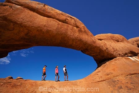 Africa;archway;archways;boy;boys;child;children;Erongo-Region;families;family;family-holiday;family-holidays;female;geological;geology;girl;girls;Groot-Spitzkop;holiday;holidays;mother;Namib-Desert;Namibia;Natural-Arch;Natural-Arches;natural-bridge;natural-bridges;natural-geological-formation;natural-geological-formations;Natural-Rock-Arch;natural-rock-arches;natural-rock-archs;natural-rock-bridge;natural-rock-bridges;people;person;rock;rock-arch;rock-arches;rock-formation;rock-formations;rock-outcrop;rock-outcrops;rock-tor;rock-torr;rock-torrs;rock-tors;rocks;Southern-Africa;Spitzkop;Spitzkoppe;stone;tourism;tourist;tourists;unusual-natural-feature;unusual-natural-features;unusual-natural-formation;unusual-natural-formations;wilderness;wilderness-area;wilderness-areas;woman