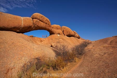 Africa;archway;archways;boy;boys;child;children;Erongo-Region;families;family;family-holiday;family-holidays;female;geological;geology;girl;girls;Groot-Spitzkop;holiday;holidays;mother;Namib-Desert;Namibia;Natural-Arch;Natural-Arches;natural-bridge;natural-bridges;natural-geological-formation;natural-geological-formations;Natural-Rock-Arch;natural-rock-arches;natural-rock-archs;natural-rock-bridge;natural-rock-bridges;people;person;rock;rock-arch;rock-arches;rock-formation;rock-formations;rock-outcrop;rock-outcrops;rock-tor;rock-torr;rock-torrs;rock-tors;rocks;Southern-Africa;Spitzkop;Spitzkoppe;stone;tourism;tourist;tourists;unusual-natural-feature;unusual-natural-features;unusual-natural-formation;unusual-natural-formations;wilderness;wilderness-area;wilderness-areas;woman