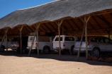 4wd;4wds;4wds;4x4;4x4s;4x4s;Africa;Damaraland;four-by-four;four-by-fours;four-wheel-drive;four-wheel-drives;heat;hot;Kunene-District;Kunene-Region;Namibia;park;parking;parks;Petrified-Forest;shade;shady;Southern-Africa;sports-utility-vehicle;sports-utility-vehicles;suv;suvs;under-cover-parking;vehicle;vehicles