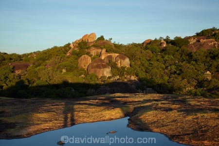 Africa;Big-Cave-Camp;boulder;boulders;Bulawayo;calm;geological;geology;granite;kopje;kopjes;koppie;koppies;Matobo-Hills;Matobo-National-Park;Matopos-Hills;placid;pond;ponds;pool;pools;quiet;reflected;reflection;reflections;rock;rock-formation;rock-formations;rock-outcrop;rock-outcrops;rock-tor;rock-torr;rock-torrs;rock-tors;rocks;serene;smooth;Southern-Africa;still;stone;tranquil;unusual-natural-feature;unusual-natural-features;water;Zimbabwe