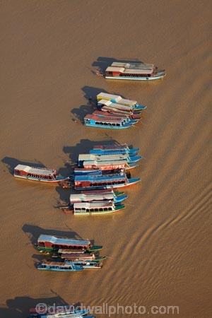 aerial;aerial-image;aerial-images;aerial-photo;aerial-photograph;aerial-photographs;aerial-photography;aerial-photos;aerial-view;aerial-views;aerials;Asia;boat;boats;Cambodia;Chong-Khneas-Port;Chong-Khnies;Chong-Kneas;dirty-water;Indochina-Peninsula;Kampuchea;Kingdom-of-Cambodia;long-boat;long-boats;muddy-water;passenger-boat;passenger-boats;Phnom-Krom;Port-of-Chong-Khneas;Siem-Reap;Siem-Reap-Province;Siem-Reap-River;Southeast-Asia;tourist-boat;tourist-boats;water