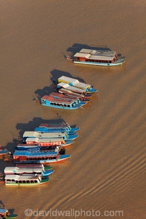 aerial;aerial-image;aerial-images;aerial-photo;aerial-photograph;aerial-photographs;aerial-photography;aerial-photos;aerial-view;aerial-views;aerials;Asia;boat;boats;Cambodia;Chong-Khneas-Port;Chong-Khnies;Chong-Kneas;dirty-water;Indochina-Peninsula;Kampuchea;Kingdom-of-Cambodia;long-boat;long-boats;muddy-water;passenger-boat;passenger-boats;Phnom-Krom;Port-of-Chong-Khneas;Siem-Reap;Siem-Reap-Province;Siem-Reap-River;Southeast-Asia;tourist-boat;tourist-boats;water