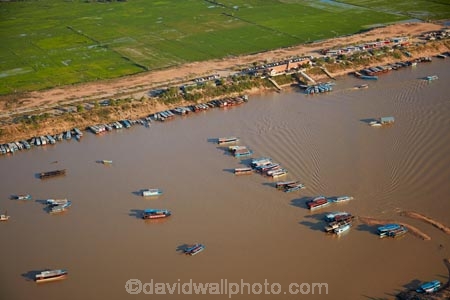 aerial;aerial-image;aerial-images;aerial-photo;aerial-photograph;aerial-photographs;aerial-photography;aerial-photos;aerial-view;aerial-views;aerials;agricultural;agriculture;Asia;boat;boats;Cambodia;Chong-Khneas-Port;Chong-Khnies;Chong-Kneas;country;countryside;crop;crops;dirty-water;farm;farming;farmland;farms;field;fields;flood-plain;flood-plains;floodplain;floodplains;green;grow;horticulture;Indochina-Peninsula;Kampuchea;Kingdom-of-Cambodia;long-boat;long-boats;Lower-Mekong-Basin;lush;meadow;meadows;Mekong-Plain;muddy-water;paddock;paddocks;paddy-field;paddy-fields;passenger-boat;passenger-boats;pasture;pastures;Phnom-Krom;Port-of-Chong-Khneas;rice-field;rice-fields;rice-growing;rice-paddies;rice-paddy;rice-production;rural;Siem-Reap;Siem-Reap-Province;Siem-Reap-River;Southeast-Asia;tourist-boat;tourist-boats;verdant;water