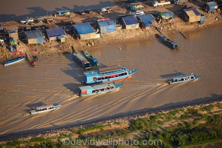 aerial;aerial-image;aerial-images;aerial-photo;aerial-photograph;aerial-photographs;aerial-photography;aerial-photos;aerial-view;aerial-views;aerials;Asia;boat;boats;Cambodia;Chong-Khneas-Port;Chong-Khnies;Chong-Kneas;dirty-water;Indochina-Peninsula;Kampuchea;Kingdom-of-Cambodia;long-boat;long-boats;muddy-water;passenger-boat;passenger-boats;Phnom-Krom;Port-of-Chong-Khneas;Siem-Reap;Siem-Reap-Province;Siem-Reap-River;Southeast-Asia;tourist-boat;tourist-boats;water