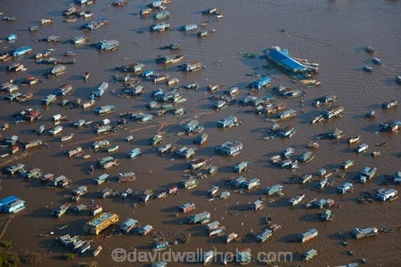 aerial;aerial-image;aerial-images;aerial-photo;aerial-photograph;aerial-photographs;aerial-photography;aerial-photos;aerial-view;aerial-views;aerials;Asia;Cambodia;Cambodian-floating-village;Cambodian-floodplain;Cambodian-village;Chong-Khneas;Chong-Khneas-Floating-Village;Chong-Khnies;Chong-Kneas;Chong-Kneas-Floating-Village;dirty-water;floating-home;floating-homes;floating-house;floating-houses;floating-shop;floating-shops;Floating-Village;Floating-Villages;freshwater-lake;freshwater-lakes;Indochina-Peninsula;Kampuchea;Kingdom-of-Cambodia;lake;lakes;Lower-Mekong-Basin;Mekong-Plain;muddy-water;Siem-Reap;Siem-Reap-Province;Southeast-Asia;Tonle-Sap;Tonle-Sap-Lake;TonlÃ©-Sap;TonlÃ©-Sap-Lake;UNESCO-Biosphere-Reserve;water
