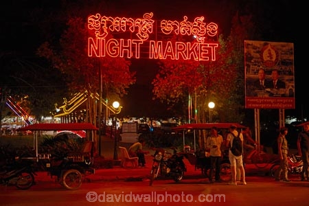 Asia;Auto-rickshaw;Auto-rickshaws;Cambodia;commerce;commercial;craft-market;craft-markets;Curio-and-Handcraft-Market;Curio-and-Handicraft-Market;curio-market;curio-markets;dark;dusk;evening;handcraft;Handcraft-Market;Handcraft-Markets;handcrafts;handicraft;Handicraft-Market;Handicraft-Markets;handicrafts;Indochina-Peninsula;Kampuchea;Kingdom-of-Cambodia;light;lighting;lights;market;market-place;market-stall;market-stalls;market_place;marketplace;marketplaces;markets;motorcycle-taxi;motorcycle-taxis;motorized-rickshaw;motorized-rickshaws;neon-light;neon-lights;night;night-market;night-markets;night-time;night_time;people;person;retail;retailer;retailers;shop;shopping;shops;Siem-Reap;Siem-Reap-Province;Southeast-Asia;souvenir;souvenir-market;souvenir-markets;souvenirs;stall;stalls;steet-scene;street-scenes;three_wheeler;three_wheelers;tourism;tourist;tourist-market;tourist-markets;tourists;tuk-tuk;tuk-tuks;tuk_tuk;tuk_tuks;tuktuk;tuktuks;twilight;wood-carving;wood-carvings