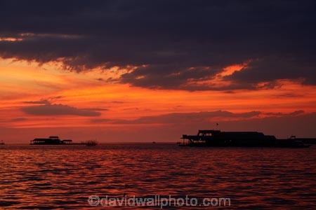 Asia;Cambodia;Cambodian-floating-village;Cambodian-floodplain;Cambodian-village;Chong-Khneas;Chong-Khneas-Floating-Village;Chong-Khnies;Chong-Kneas;Chong-Kneas-Floating-Village;dusk;evening;floating-home;floating-homes;floating-house;floating-houses;floating-restaurant;floating-restaurants;floating-shop;floating-shops;Floating-Village;Floating-Villages;freshwater-lake;freshwater-lakes;Indochina-Peninsula;Kampuchea;Kingdom-of-Cambodia;lake;lakes;Lower-Mekong-Basin;Mekong-Plain;night;night_time;nightfall;orange;Siem-Reap;Siem-Reap-Province;Southeast-Asia;sunset;sunsets;Tonle-Sap;Tonle-Sap-Lake;TonlÃ©-Sap;TonlÃ©-Sap-Lake;tourist-restaurant;tourist-restaurants;twilight;UNESCO-Biosphere-Reserve