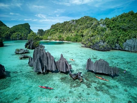 Namlol;Namlol-Lagoon;Namlol-Island;kayak;kayaking;kayaks;adventure;adventure-tourism;boat;boats;canoe;canoeing;canoes;coast;coastal;coastline;coastlines;coasts;ocean;oceans;sea;sea-kayak;sea-kayaking;sea-kayaks;kayaker;kayakers;paddle;paddler;paddlers;paddling;people;person;sea-kayaker;sea-kayakers;Reef;Coral-reef;coral;coral-reefs;corals;reef;reefs;aqua;aquamarine;blue;clean-water;clear-water;coast;cobalt-blue;cobalt-ultramarine;cobalt;ultramarine;teal-blue;tropical-island;tropical-islands;tropical-reef;tropical-reefs;turquoise;karst-landscape;limestone-karsts;karst;karsts;limestone;topography;landscape;landscapes;island;islands;karst-formations;karst-formation;Indonesia;aerial;aerial-photo;aerial-photograph;aerial-photographs;aerial-photography;aerial-photos;aerial-view;aerial-views;aerials;drone-aerial;drone;Misool;Raja-Ampat;West-Papua;Southwest-Papua;Misool-Is;Misool-Island;karst-landscape;landscape;landscapes;island;islands;outer-archipelago;archipelago;Misool-archipelago;paradise;tourism;travel