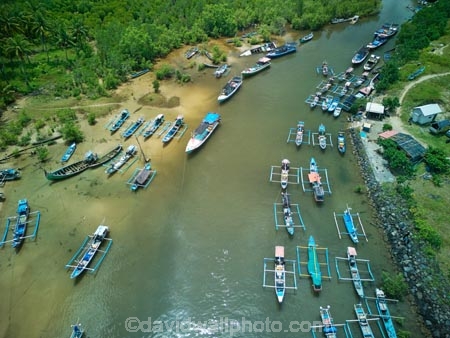 Indonesia;aerial;aerial-photo;aerial-photograph;aerial-photographs;aerial-photography;aerial-photos;aerial-view;aerial-views;aerials;drone-aerial;drone;Java;East-Java;Indonesia;Asia;South-East-Asia;Southeast-Asia;Banyuwangi-Region;Sumberagung;Pancer;Pantai-Lampon;Pancer-Hamlet;Dusun-Pancer;Longboat;longboats;narrow-boat;narrow-boats;boat;boats;motor-boat.-motorboat;motor-boats;motorboats;sampan;jukung;kano:-cadik;Indonesian;outrigger-canoe;traditional-fishing-boat;traditional-boat;fishing-boat;estuaries;estuary;inlet;inlets;lagoon;lagoons;tidal;river;rivers