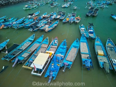 Indonesia;aerial;aerial-photo;aerial-photograph;aerial-photographs;aerial-photography;aerial-photos;aerial-view;aerial-views;aerials;drone-aerial;drone;Java;East-Java;Indonesia;Asia;South-East-Asia;Southeast-Asia;Banyuwangi-Region;Sumberagung;Pancer;Pantai-Lampon;Pancer-Hamlet;Dusun-Pancer;Longboat;longboats;narrow-boat;narrow-boats;boat;boats;motor-boat.-motorboat;motor-boats;motorboats;sampan;traditional-fishing-boat;traditional-boat;fishing-boat;blue;blue-boat;blue-boats;harbor;harbors;harbour;harbours;marina;marinas