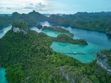Indonesia;aerial;aerial-photo;aerial-photograph;aerial-photographs;aerial-photography;aerial-photos;aerial-view;aerial-views;aerials;drone-aerial;drone;Misool;Raja-Ampat;West-Papua;Southwest-Papua;Misool-Is;Misool-Island;karst-landscape;limestone-karsts;karst;karsts;limestone;topography;landscape;landscapes;island;islands;Misool-archipelago;inner-archipelago;archipelago;Dapunlol-jetty;Dapunlol-peak;Dapunlol-Island;Dapunlol;Dapunlol-area;Puncak-Harfat;Puncak-Harfat;Harun-Fatimah;tourism;travel
