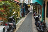 alley;alleyway;alleyways;alleys;motorbike;motorcycles;motorcyle;motorbikes;scooter;scooters;Malang-old-town;old-towns;old-town;Kayutangan;Kampoeng;Kauman-Village;Malang-City;Java;East-Java;Malang;Indonesia;Asia;South-East-Asia;Southeast-Asia