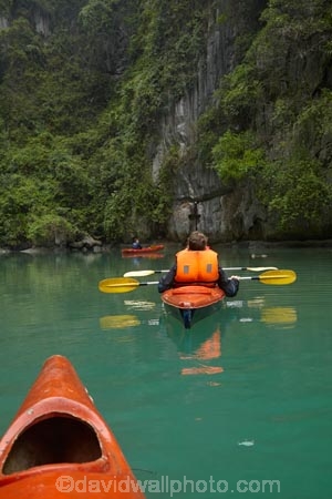 adventure;adventure-tourism;Asia;boat;boats;calm;canoe;canoeing;canoes;Ha-Long-Bay;Halong-Bay;karst-landscape;kayak;kayaker;kayakers;Kayakers-at-Ha-Long-Bay-UNESCO-World-Heritage-Site-;Quang-Ninh-Province;Vietnam;kayaking;kayaks;limestone-karsts;North-Vietnam;Northern-Vietnam;paddle;paddler;paddlers;paddling;people;person;placid;Qung-Ninh-Province;Quang-Ninh-Province;quiet;reflected;reflection;reflections;sea-kayak;sea-kayaker;sea-kayakers;sea-kayaking;sea-kayaks;serene;smooth;South-East-Asia;Southeast-Asia;still;tourism;tourist;tourists;tranquil;UN-world-heritage-area;UN-world-heritage-site;UNESCO-World-Heritage-area;UNESCO-World-Heritage-Site;united-nations-world-heritage-area;united-nations-world-heritage-site;Vnh-H-Long;vacation;vacations;Vietnam;Vietnamese;water;world-heritage;world-heritage-area;world-heritage-areas;World-Heritage-Park;World-Heritage-site;World-Heritage-Sites;model-released;MR