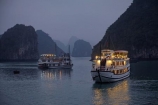 Asia;boat;boats;calm;cruise-boat;cruise-boats;cruising;dusk;evening;Ha-Long-Bay;Halong-Bay;Halong-Phoenix-Boat;Halong-Phoenix-Cruiser-Boat;Halong-Phoenix-Cruiser-Tour-Boat;karst-landscape;light;lighting;lights;limestone-karsts;night;nightfall;North-Vietnam;Northern-Vietnam;placid;Qung-Ninh-Province;Quang-Ninh-Province;quiet;reflected;reflection;reflections;serene;smooth;South-East-Asia;Southeast-Asia;still;tour-boat;tour-boats;tourism;tourist;tourist-boat;tourist-boats;tourists;tranquil;travel-destination;UN-world-heritage-area;UN-world-heritage-site;UNESCO-World-Heritage-area;UNESCO-World-Heritage-Site;united-nations-world-heritage-area;united-nations-world-heritage-site;Vnh-H-Long;Vietnam;Vietnamese;water;world-heritage;world-heritage-area;world-heritage-areas;World-Heritage-Park;World-Heritage-site;World-Heritage-Sites