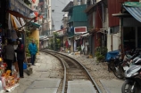alley;alleys;alleyway;alleyways;apartments;Asia;Asian;back-street;back-streets;backstreet;backstreets;Hanoi;house;houses;housing;lane;lanes;laneway;laneways;people;person;poor;poverty;rail-line;rail-lines;rail-track;rail-tracks;railroad;railroads;railway;railway-line;railway-lines;railway-track;railway-tracks;railways;South-East-Asia;Southeast-Asia;street;street-scene;street-scenes;streets;track;tracks;train-track;train-tracks;transport;transportation;Vietnam;Vietnamese