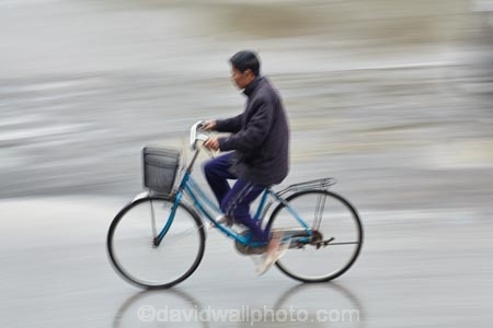 Asia;bicycle;bicycles;bike;bikes;blur;blurred;blurry;cycle;cycler;cyclers;cycles;cyclist;cyclists;man;men;Ninh-Binh;Ninh-BÃ¬nh-province;Ninh-Hai;Northern-Vietnam;old-man;old-men;people;person;push-bike;push-bikes;push_bike;push_bikes;pushbike;pushbikes;rain;raining;rainy;South-East-Asia;Southeast-Asia;speed-blur;street;street-scene;street-scenes;streets;Van-Lam-Village;Vietnam;Vietnamese