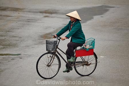 Asia;Asian-conical-hat;Asian-conical-hats;bicycle;bicycles;bike;bikes;conical-hat;conical-hats;cycle;cycler;cyclers;cycles;cyclist;cyclists;female;females;leaf-hat;leaf-hats;Ninh-Binh;Ninh-Bình-province;Ninh-Hai;non-la;Northern-Vietnam;nón-lá;palm_leaf-conical-hat;people;person;push-bike;push-bikes;push_bike;push_bikes;pushbike;pushbikes;rain;raining;rainy;South-East-Asia;Southeast-Asia;street;street-scene;street-scenes;streets;Van-Lam-Village;Vietnam;Vietnamese;Vietnamese-conical-hat;Vietnamese-conical-hats;Vietnamese-hat;Vietnamese-hats;Vietnamese-symbol;women