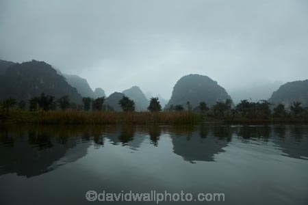 Asia;cloud;cloudy;karst-topography;karsts;limestone-karst;limestone-karsts;limestone-landscape;mist;mists;misty;Ninh-Binh;Ninh-BÃ¬nh-province;Northern-Vietnam;Red-River-Delta;river;rivers;South-East-Asia;Southeast-Asia;Trang-An;Trang-An-Landscape-Complex;Trang-An-Lanscape-Complex;Trang-An-World-Heritage-Site;TrÃ ng-An;UN-world-heritage-area;UN-world-heritage-site;UNESCO-World-Heritage-area;UNESCO-World-Heritage-Site;united-nations-world-heritage-area;united-nations-world-heritage-site;Vietnam;Vietnamese;water;world-heritage;world-heritage-area;world-heritage-areas;World-Heritage-Park;World-Heritage-site;World-Heritage-Sites