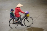 Asia;Asian-conical-hat;Asian-conical-hats;bicycle;bicycles;bike;bikes;child;children;conical-hat;conical-hats;cycle;cycler;cyclers;cycles;cyclist;cyclists;leaf-hat;leaf-hats;Ninh-Binh;Ninh-Bình-province;Ninh-Hai;non-la;Northern-Vietnam;nón-lá;palm_leaf-conical-hat;people;person;push-bike;push-bikes;push_bike;push_bikes;pushbike;pushbikes;rain;raining;rainy;South-East-Asia;Southeast-Asia;street;street-scene;street-scenes;streets;Van-Lam-Village;Vietnam;Vietnamese;Vietnamese-conical-hat;Vietnamese-conical-hats;Vietnamese-hat;Vietnamese-hats;Vietnamese-symbol;woman;women