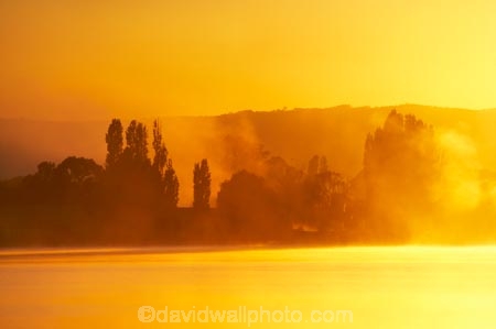 A.C.T.;ACT;Australia;Australian-Capital-Territory;break-of-day;calm;Canberra;capital;capitals;dawn;dawning;daybreak;East-Basin;first-light;lake;Lake-BG;Lake-Burley-Griffin;lakes;mist;mists;misty;morning;orange;placid;quiet;reflection;reflections;serene;silhouette;silhoutettes;smooth;still;sunrise;sunrises;sunup;tranquil;twilight;water