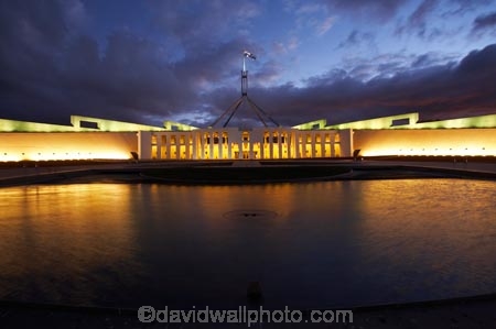 A.C.T.;ACT;architectual;architecture;Australia;Australian-Capital-Territory;Australian-Federal-Parliament;Australian-Flag;Australian-Flags;Australian-Parliament;building;buildings;calm;Canberra;Canberra-City;capital;Capital-Hill;capitals;city;column;columns;dark;dusk;evening;federal-government;flag;flag-pole;flag-poles;flag-post;flag-posts;flagpole;flagpoles;flagpost;flagposts;flags;flagstaff;flagstaffs;flood-lighting;flood-lights;flood-lit;flood_lighting;flood_lights;flood_lit;floodlighting;floodlights;floodlit;government;house-of-parliament;houses-of-parliament;light;lights;Mitchell,-Giurgola-and-Thorp-Architects;New-Parliament-House;night;night-time;night_time;Parliament;Parliament-Building;Parliament-House;pillar;pillars;placid;pond;ponds;quiet;reflection;reflections;seat-of-government;serene;smooth;still;tranquil;twilight;water