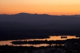 A.C.T.;ACT;Australia;Australian-Capital-Territory;calm;Canberra;capital;capitals;dusk;evening;lake;Lake-BG;Lake-Burley-Griffin;lakes;Mount-Ainslie;Mt-Ainslie;Mt.-Ainslie;nightfall;orange;placid;quiet;reflection;reflections;serene;sky;smooth;still;sunset;sunsets;tranquil;twilight;water