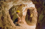 Australasian;Australia;Australian;Australian-Outback;cave;cavern;caverns;caves;claustrophobic;Coober-Pedy;dugout;dugouts;excavate;excavating;excavation;grotto;grottos;hard-hat;heritage;historic;historic-mine;historic-mines;historical;historical-mine;historical-mines;history;mine;mines;mining;old;Old-Timers-Mine;Old-Timers-Opal-Mine;opal-mine;opal-mines;Outback;people;person;red-centre;S.A.;SA;South-Australia;subterranean;tourist;tourists;tradition;traditional;under-ground;under_ground;underground;underworld;visitor