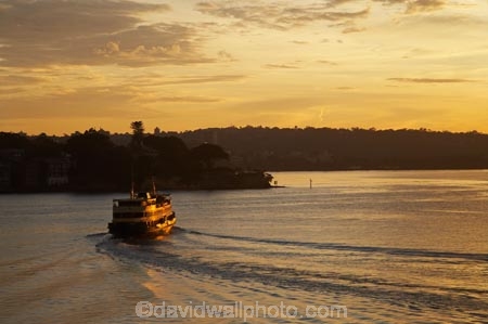 Australasia;Australia;boat;boats;break-of-day;dawn;dawning;daybreak;ferries;ferry;first-light;Manly-Ferry;morning;N.S.W.;New-South-Wales;NSW;orange;passenger-ferries;passenger-ferry;sunrise;sunrises;sunup;Sydney;Sydney-Harbor;Sydney-Harbour;transport;transportation;travel;twilight;vessel;vessels;water