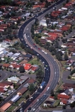 Highway;highways;Olympic;Park;Sydney;Australia;aerial;aerials;road;roads;roading;car;cars;transport;traffic;transportation;s-bend;s;bend;residential;residences;housing;houses;house
