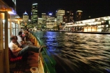 ferry;passenger;sydney;australia;cove;harbor;harbors;harbours;commute;commuters;offices;CBD;C.B.D.;office;skyscraper;skyscrapers;wharf;wharves;jetty;travel;night;commute;boat;boats-;ferries;light;lights;dark;water;harbour