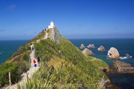 bluff;bluffs;Catlins-District;cliff;cliffs;clutha-district;coast;coastal;coastline;horizon;light-house;light-houses;lighthouse;lighthouses;New-Zealand;Nugget-Point;ocean;pacific;people;rock;rocks;sea;South-Island;south-otago;tourism;tourist;tourists;track;walkers;wave;waves