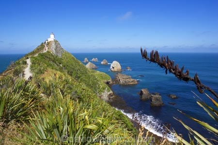bluff;bluffs;Catlins-District;cliff;cliffs;clutha-district;coast;coastal;coastline;flax;horizon;light-house;light-houses;lighthouse;lighthouses;New-Zealand;Nugget-Point;ocean;pacific;people;rock;rocks;sea;South-Island;south-otago;tourism;tourist;tourists;track;walkers;wave;waves