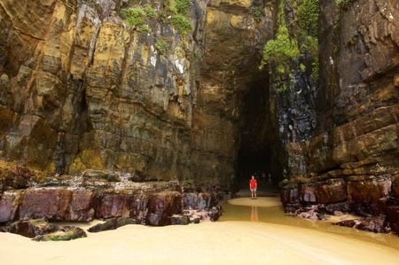 beach;beaches;Cathedral-Cave;cathedral-caves;catlins;Catlins-Coast;cave;cavern;caverns;cavers;caves;caving;coast;coastal;coastline;explore;explorers;exploring;geological;geology;grotto;grottos;New-Zealand;people;person;rock-formation;rock-formations;sand;sandy;scenic;shore;shoreline;South-Island;south-otago;southland;stone