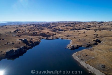 aerial;Aerial-drone;Aerial-drones;aerial-image;aerial-images;aerial-photo;aerial-photograph;aerial-photographs;aerial-photography;aerial-photos;aerial-view;aerial-views;aerials;back-country;backcountry;cabin;cabins;Central-Otago;dam;dams;Drone;Drones;fishing-cabins;fishing-camp;fishing-huts;geological;geology;high-altitude;high-country;highcountry;highlands;hut;huts;irrigation-dam;irrigation-lake;Maniototo;N.Z.;New-Zealand;NZ;Old-Dunstan-Road;Old-Dunstan-Track;Old-Dunstan-Trail;Otago;Poolburn;Poolburn-Dam;Poolburn-Lake;Poolburn-Reservoir;reflected;reflection;reflections;remote;remoteness;rock;rock-formation;rock-formations;rock-outcrop;rock-outcrops;rock-tor;rock-torr;rock-torrs;rock-tors;rocks;Rough-Ridge;S.I.;schist;schist-landscape;schist-rock;schist-rocks;SI;South-Is;South-Island;stone;unusual-natural-feature;unusual-natural-features;uplands