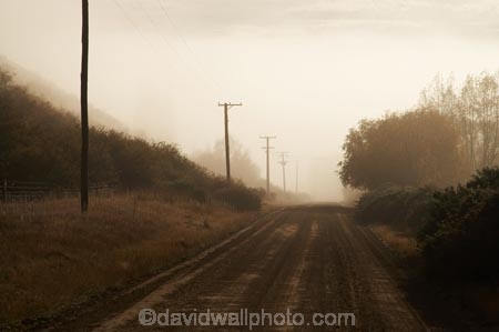 Central-Otago;countryside;fog;foggy;fogs;gravel-road;gravel-roads;line;lines;Lowburn;metal-road;metal-roads;metalled-road;metalled-roads;mist;mists;misty;N.Z.;New-Zealand;NZ;Otago;pole;poles;post;posts;power-line;power-lines;power-pole;power-poles;road;roads;rural;S.I.;SI;South-Island;telegraph-line;telegraph-lines;telegraph-pole;telegraph-poles;wire;wires