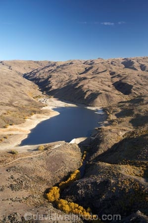 aerial;aerial-photo;aerial-photograph;aerial-photographs;aerial-photography;aerial-photos;aerial-view;aerial-views;aerials;arid;autuminal;autumn;autumn-colour;autumn-colours;autumnal;back-country;backcountry;barren;Central-Otago;Clyde;color;colors;colour;colours;dam;dams;deciduous;drought;dry;fall;Fraser-Dam;high-altitude;high-country;highcountry;highlands;irrigation-dam;irrigation-dams;N.Z.;New-Zealand;NZ;Old-Woman-Range;Otago;remote;remoteness;S.I.;season;seasonal;seasons;SI;South-Is.;South-Island;tree;trees;uplands